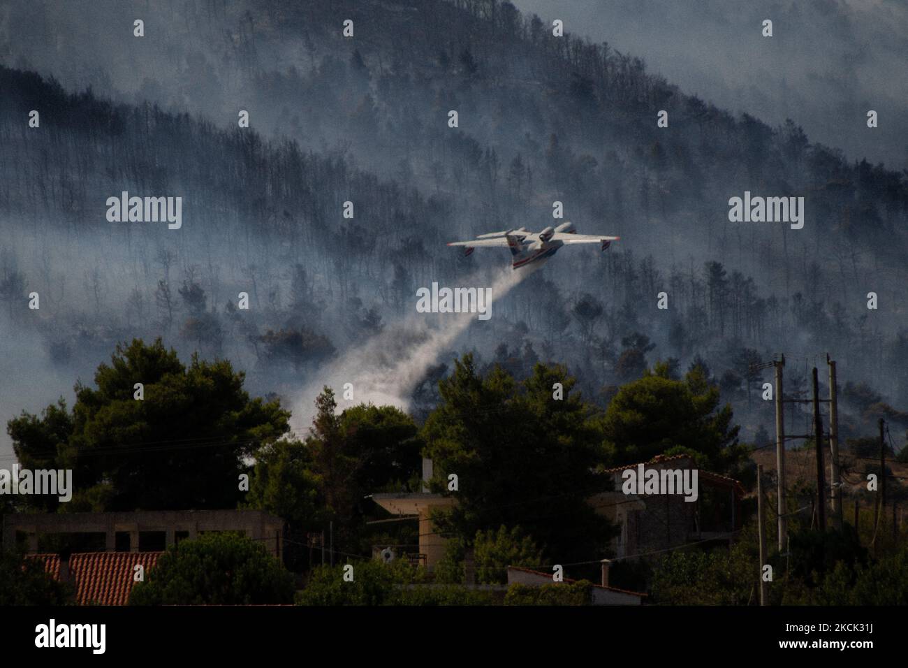 A Russian Beriev Be-20 waterbomber operating at the Vilia wildfire. On August 23rd, in 2021 in Vilia, Attica (Athens), Greece. (Photo by Maria Chourdari/NurPhoto) Stock Photo