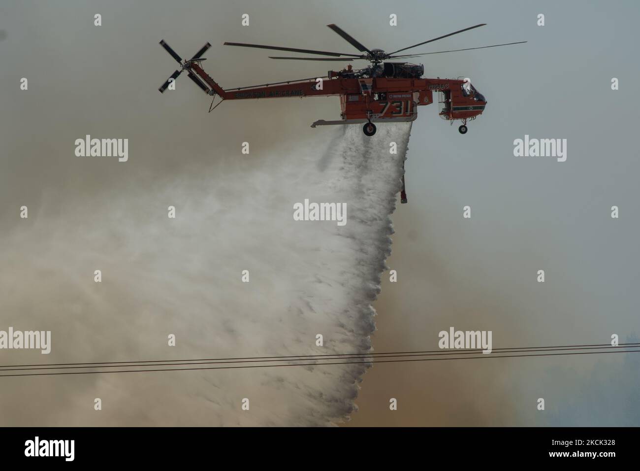 An Erickson S-64F waterbomber helicopter at the Vilia wildfire. On August 23rd, in 2021 in Vilia, Attica (Athens), Greece. (Photo by Maria Chourdari/NurPhoto) Stock Photo