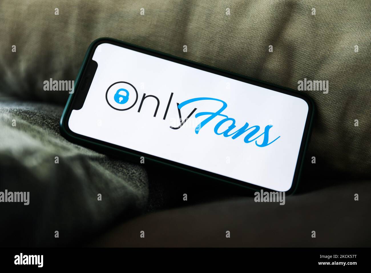 Onlyfans Logo Is Seen Displayed On A Phone Screen In This OnlyFans To