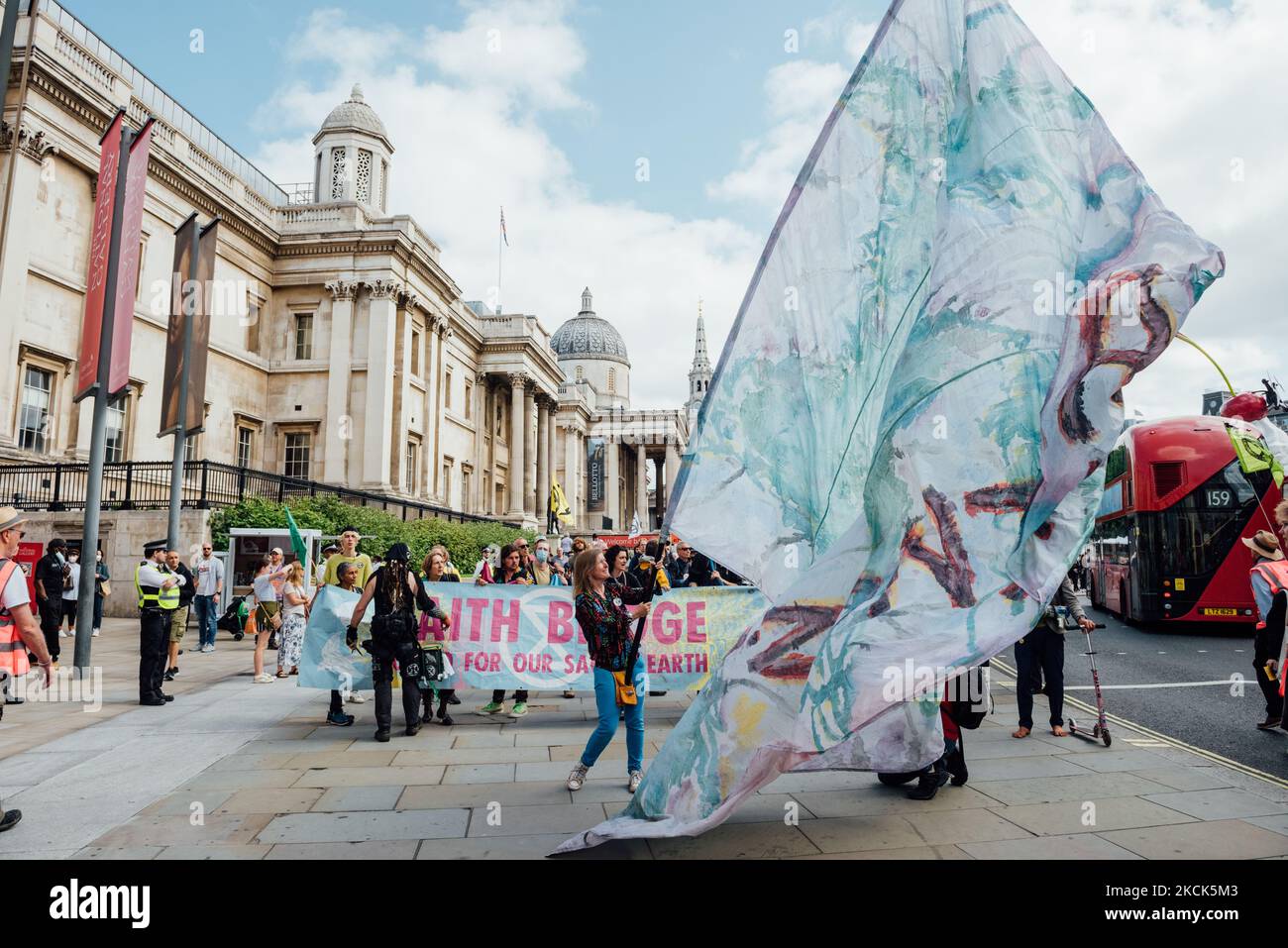 Extinction Rebellion protesters return to London, UK, on August 25, 2021 on day three of their 'Impossible Rebellion' series of actions. Beginning their day by marching from Picadilly Circus to Parlament Square, the group then erected a temporary structure in Oxford Street, where members glued themselves to each other and the surrounding structures. (Photo by Patrick Gunning/NurPhoto) Stock Photo