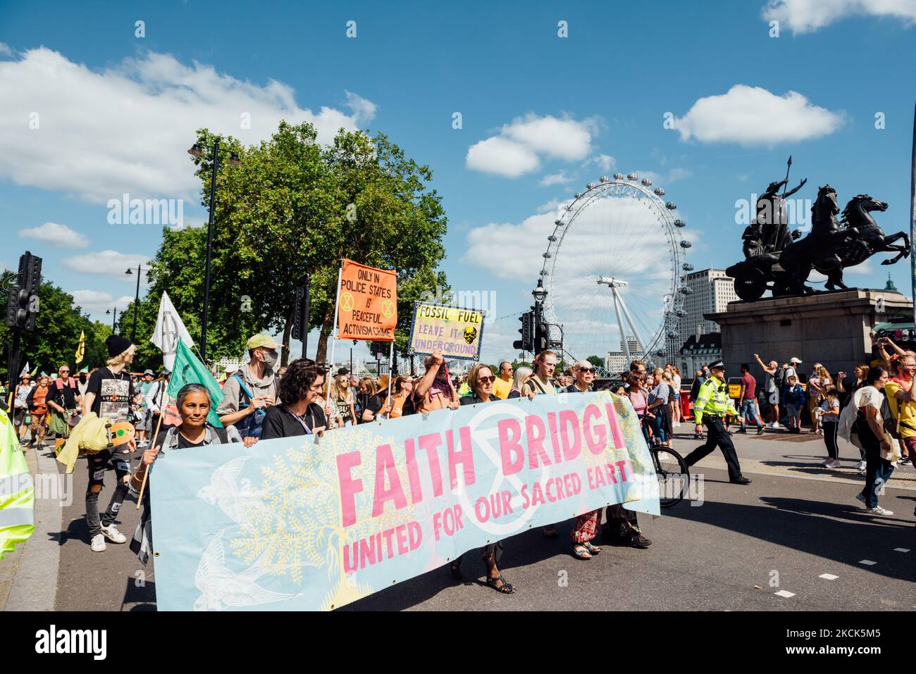 Extinction Rebellion protesters return to London, UK, on August 25, 2021 on day three of their 'Impossible Rebellion' series of actions. Beginning their day by marching from Picadilly Circus to Parlament Square, the group then erected a temporary structure in Oxford Street, where members glued themselves to each other and the surrounding structures. (Photo by Patrick Gunning/NurPhoto) Stock Photo