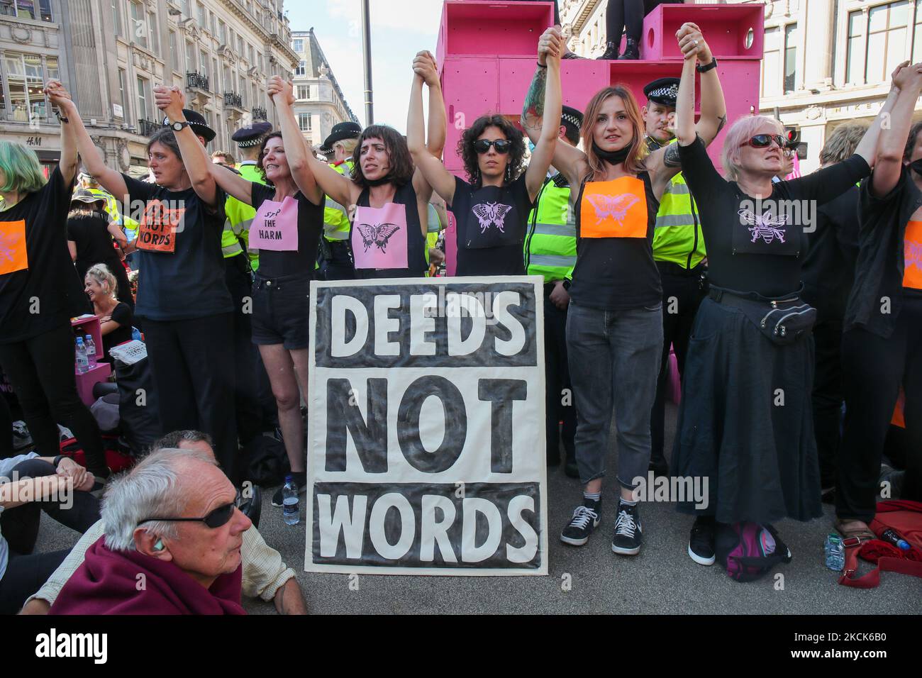 Extinction Rebellion's protestors glue themselves to objects and the