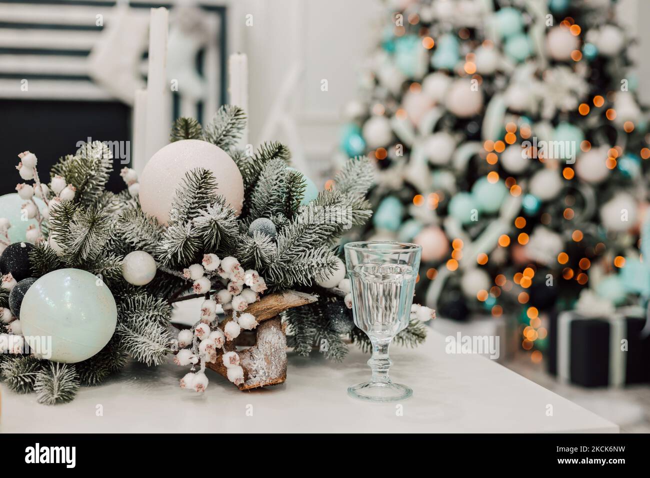 The glass on the table in the living room. Christmas interior in the apartment Stock Photo