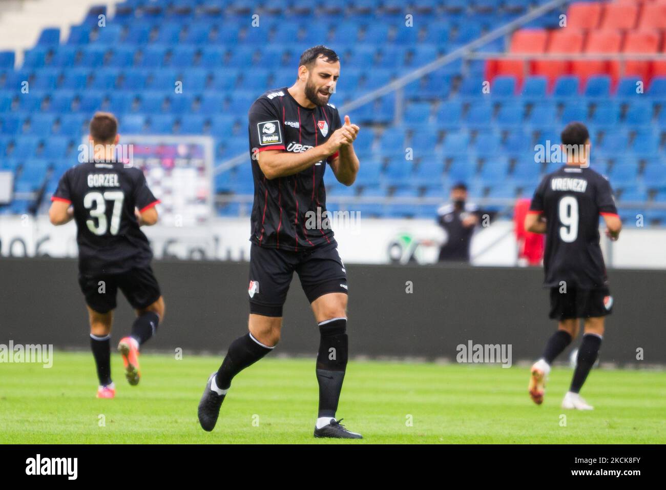 Mergim Mavraj of Tuerkguecue Muenchen gestures goal during the 3. Liga match between TSV Havelse and Tuerkguecue Muenchen at HDI-Arena on August 25, 2021 in Hanover, Germany. (Photo by Peter Niedung/NurPhoto) Stock Photo