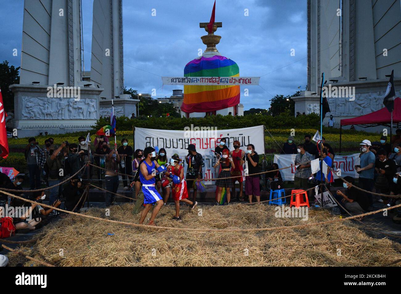 Protesters in a mask of pictures member of parliament perform in a boxing match during a protest to anti-government at Democracy Monument in Bangkok on August 28, 2021, in Bangkok, Thailand. (Photo by Vachira Vachira/NurPhoto) Stock Photo