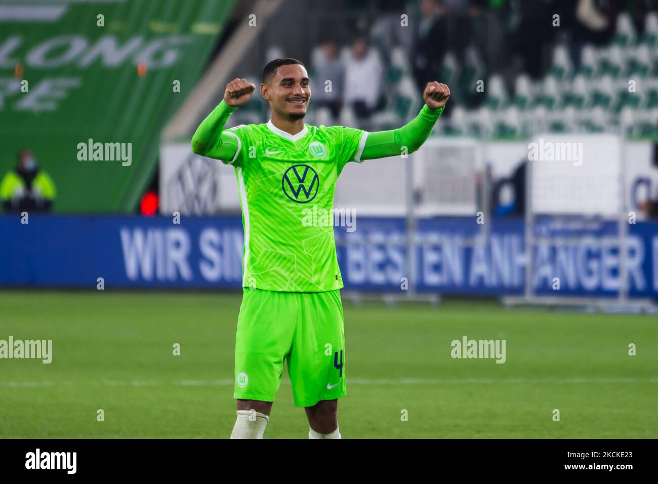 Maxence Lacroix of VfL Wolfsburg celebrate following their sides victory in the Bundesliga match between VfL Wolfsburg and RB Leipzig at Volkswagen Arena on August 29, 2021 in Wolfsburg, Germany. (Photo by Peter Niedung/NurPhoto) Stock Photo