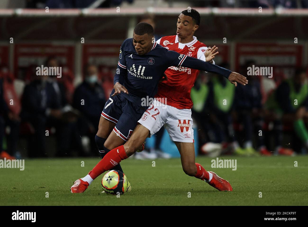 Kylian Mbappe of PSG and Hugo Ekitike of Reims compete for the ball during the Ligue 1 Uber Eats match between Reims and Paris Saint Germain at Stade Auguste Delaune on August 29, 2021 in Reims, France. (Photo by Jose Breton/Pics Action/NurPhoto) Stock Photo