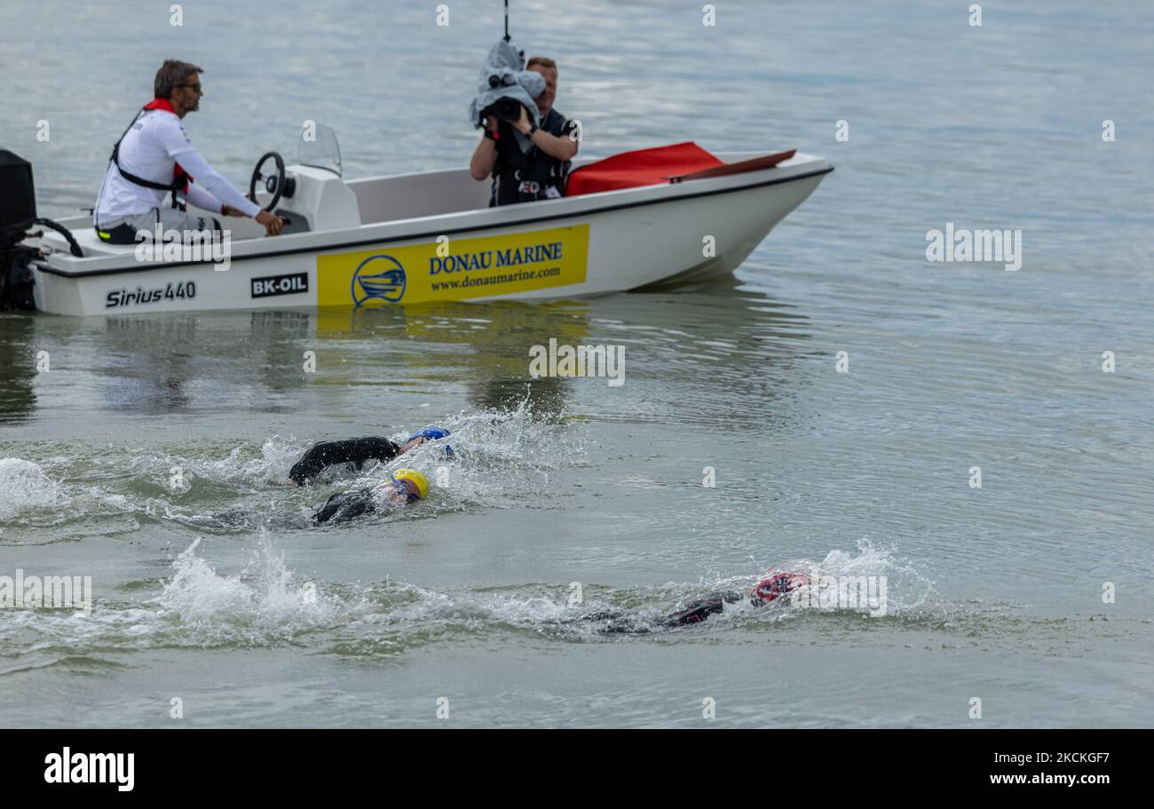 Match Nr. 1. (Taylor Knibb, Daniela Ryf, Teresa Adam) are in the water at The Collins Cup on August 28, 2021 Samorin, Slovakia. (Photo by Robert Szaniszló/NurPhoto) Stock Photo