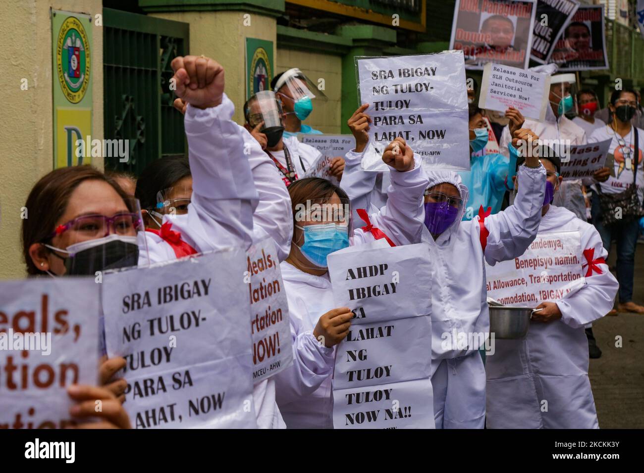 Health workers stage protests outside the Department of Health (DOH) headquarters in Manila, Philippines on September 1, 2021. Several workers from different hospitals trooped to the gates of the facility to condemn health secretary Francisco Duque III and called for his resignation for the department’s alleged misuse of COVID19 funds during the pandemic. (Photo by George Calvelo/NurPhoto) Stock Photo