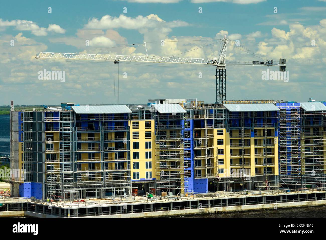 Tower lifting cranes at high residential apartment buildings ...