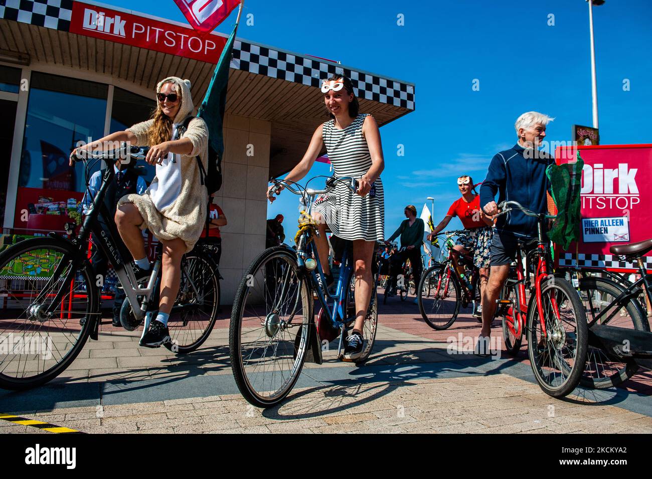 Extinction Rebellion activists are riding their bikes through one of the stores of one of the Grand Prix Formule 1 sponsors, during the Extinction Rebellion bike protest against the Formula 1 Dutch Grand Prix, in Zandvoort, on September 5th, 2021. (Photo by Romy Arroyo Fernandez/NurPhoto) Stock Photo