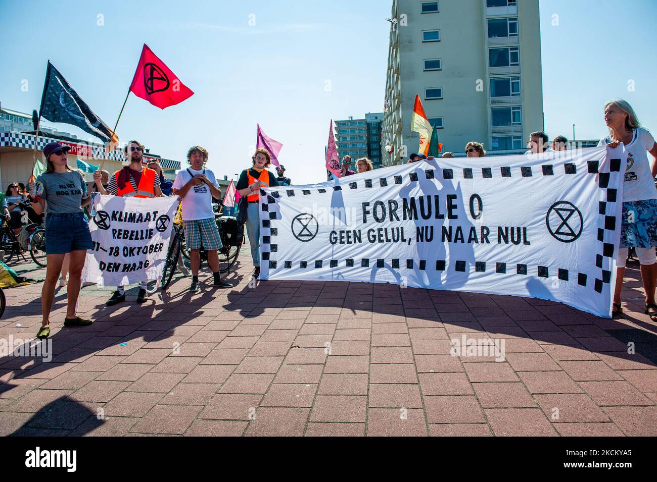 Extinction Rebellion activists are holding a placard in the middle of the walking route to the Formule 1 circuit, during the Extinction Rebellion bike protest against the Formula 1 Dutch Grand Prix, in Zandvoort, on September 5th, 2021. (Photo by Romy Arroyo Fernandez/NurPhoto) Stock Photo