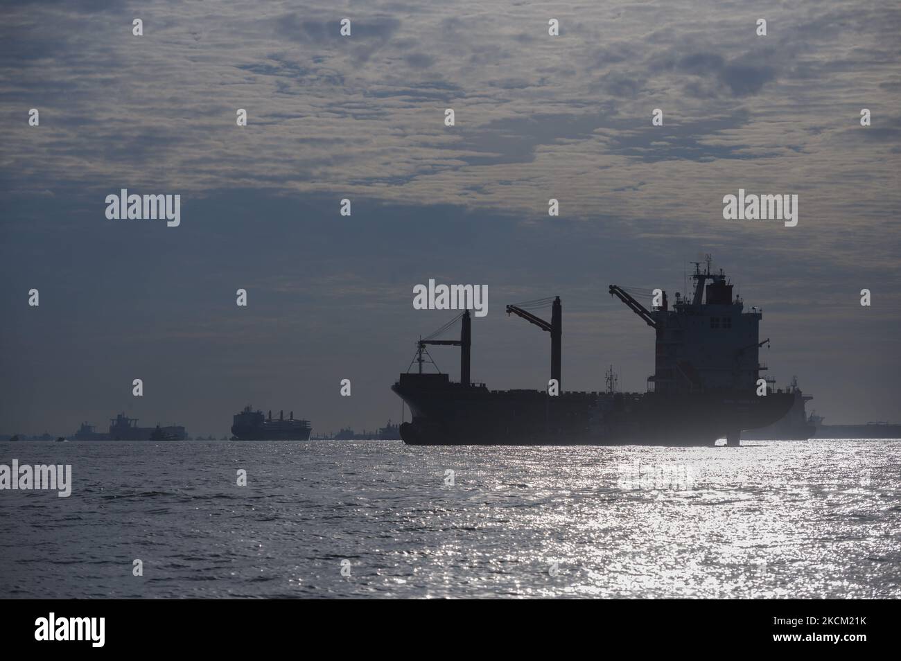 Commercial shipping vessels an anchor in the eastern anchorage of ...