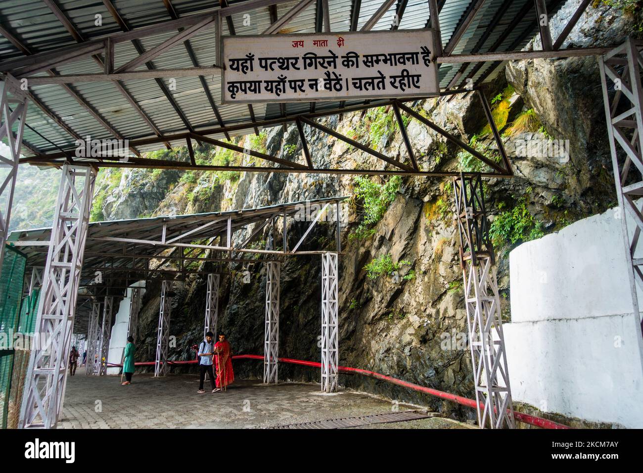 July 5th 2022 Katra, Jammu and Kashmir, India. A Public Notice board written in Hindi Language addressing 'the dangers of falling stones from the Moun Stock Photo