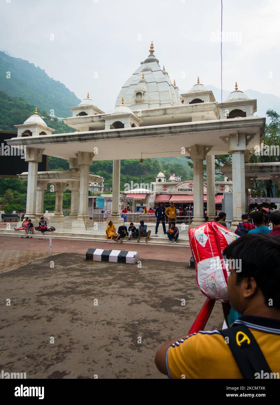 July 5th 2022 Katra, Jammu and Kashmir, India. People in queue at the entry gate check point. Shri Mata Vaishno Devi Shrine, a hindu Pilgrimage. Stock Photo