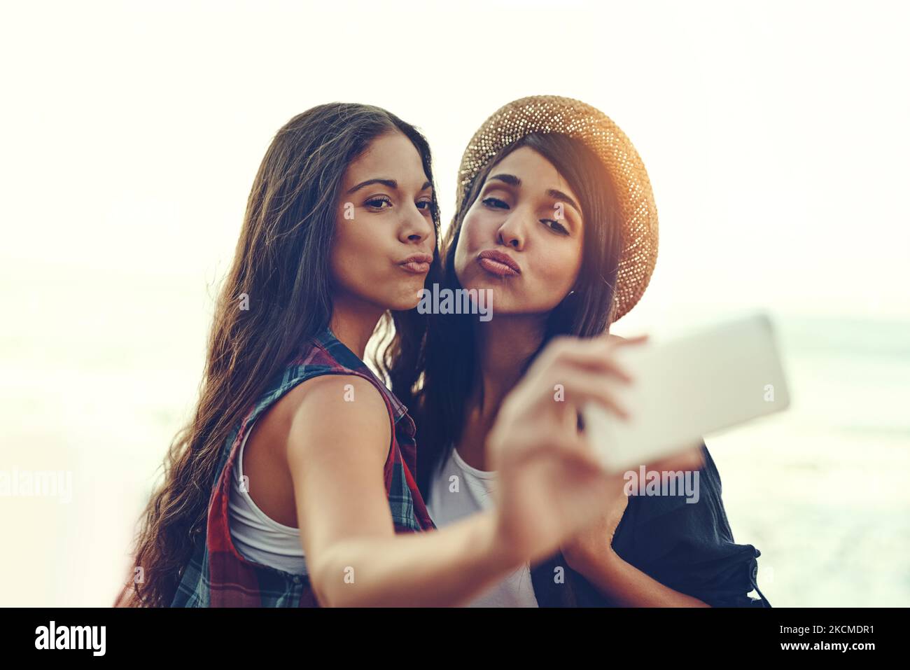 Their selfie game is on point. two young friends taking a selfie