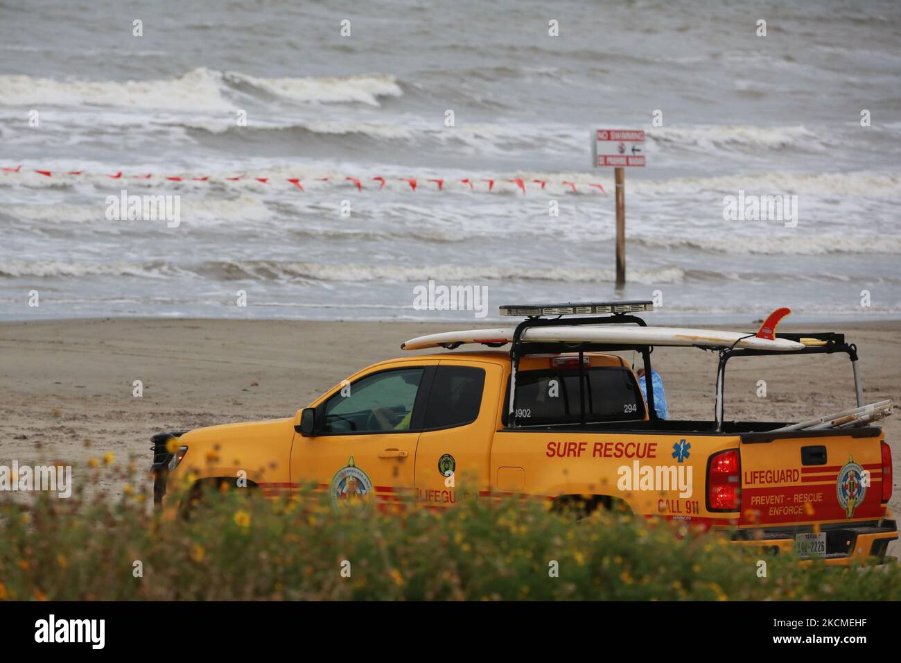 Rescue officials watch over the beach in Galveston, Texas on September