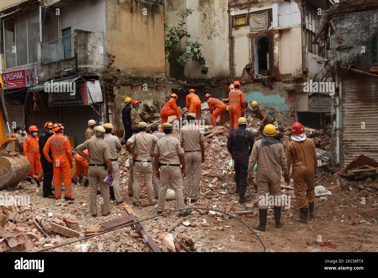 Ndff Rescue National Disaster Response Force (NDRF) officials search for survivors ...