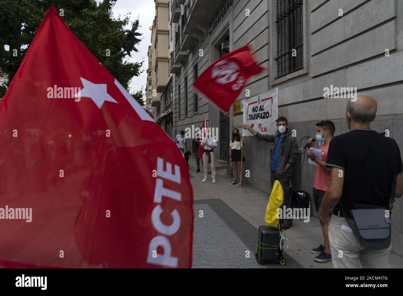 With red flags, members of the Communist Workers' Party (PCTE), concentrated against the rise in the price of electricity known as ''el tarifazo'' in the city of Santander, Spain, on September 13, 2021. (Photo by Joaquin Gomez Sastre/NurPhoto) Stock Photo