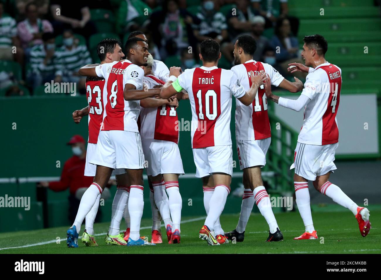 Sebastien Haller of AFC Ajax celebrates with teammates after scoring his second goal during the UEFA Champions League group C football match between Sporting CP and AFC Ajax at Jose Alvalade stadium in Lisbon, Portugal, on September 15, 2021. (Photo by Pedro FiÃºza/NurPhoto) Stock Photo