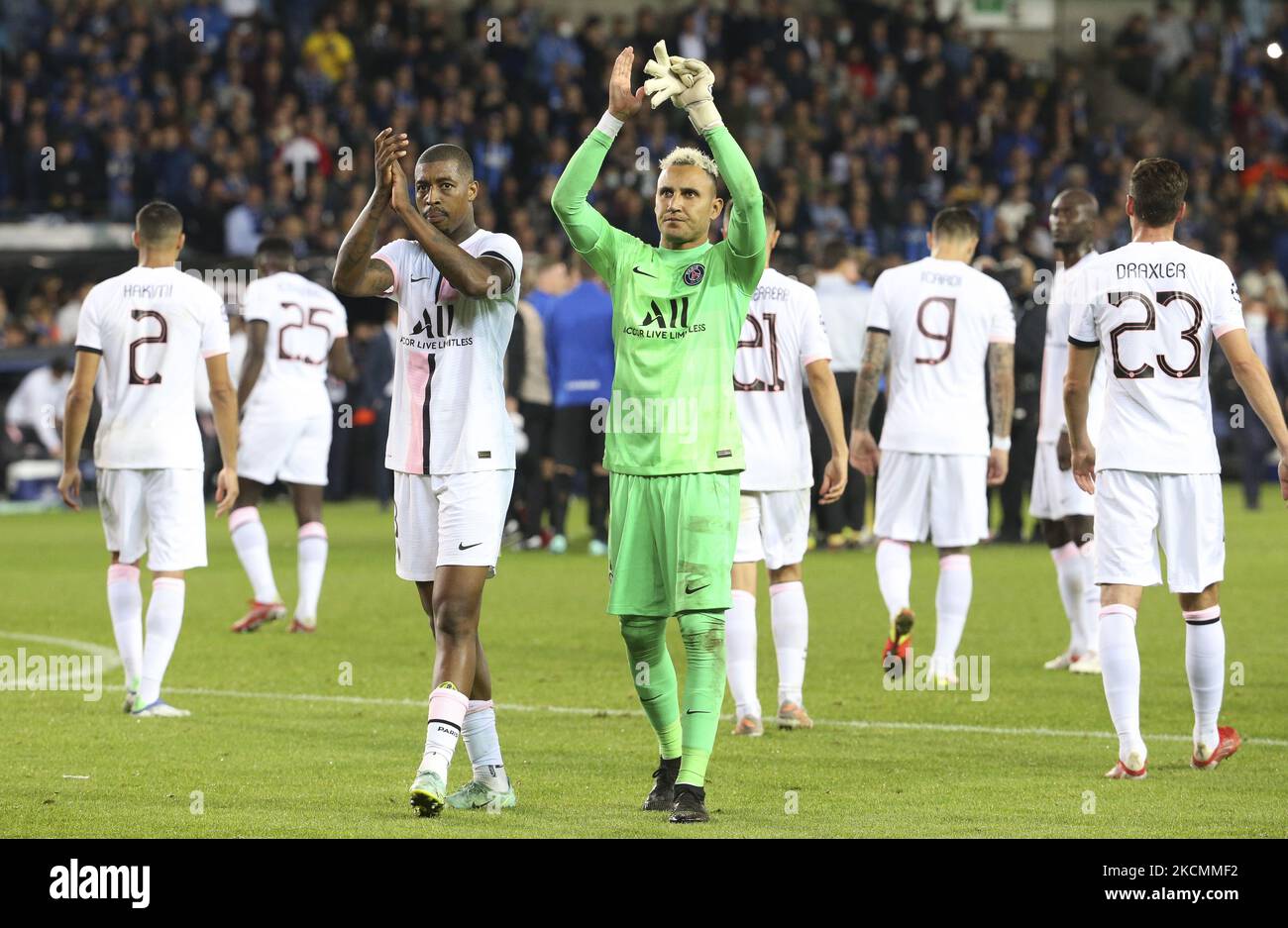 Presnel Kimpembe Goalkeeper of PSG Keylor Navas salute the supporters following the UEFA Champions League, Group Stage, Group 1 football match between Club Brugge KV and Paris Saint-Germain (PSG)on September 15, 2021 at Jan Breydel Stadion in Bruges, Belgium (Photo by Jean Catuffe/DPPI/LiveMedia/NurPhoto) Stock Photo