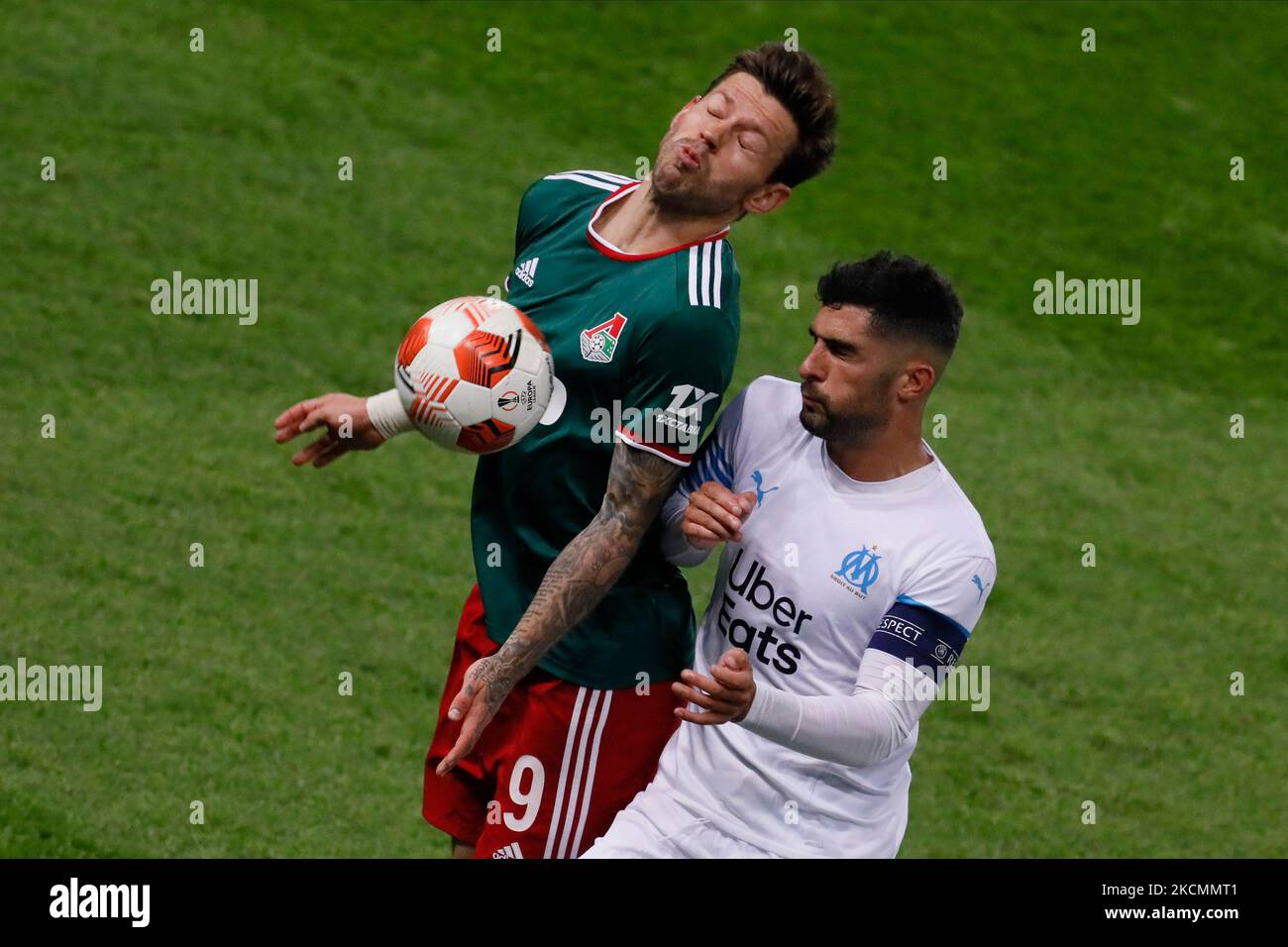 Fedor Smolov (L) of Lokomotiv Moscow and Alvaro Gonzalez of Marseille vie for the ball during the UEFA Europa League Group E match between Lokomotiv Moscow and Olympique de Marseille on September 16, 2021 at RZD Arena in Moscow, Russia. (Photo by Mike Kireev/NurPhoto) Stock Photo