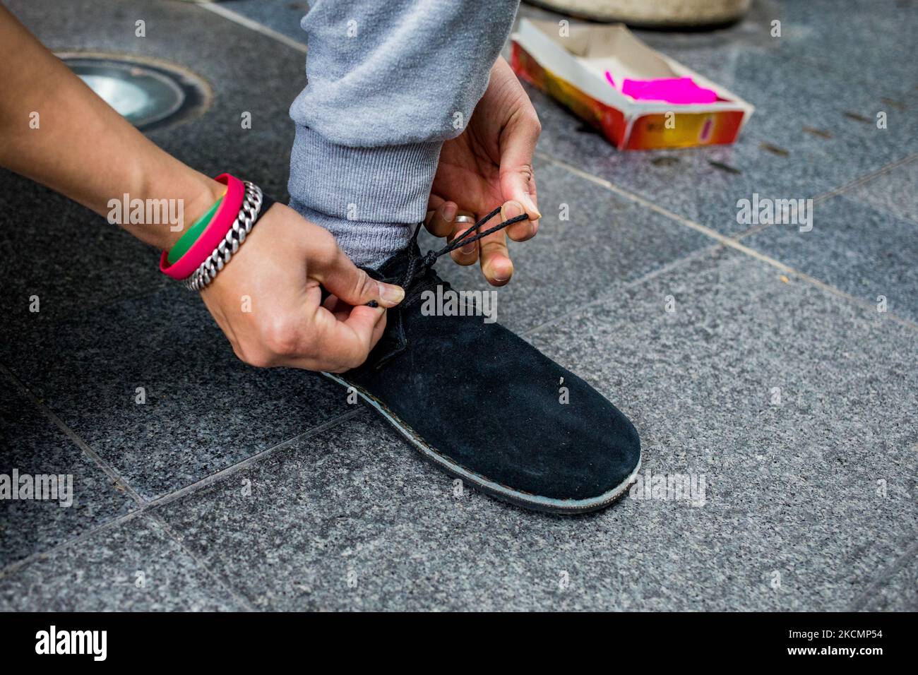 Paris, France on 23 May 2021. A plumfoot player puts on his professional shoes coming from Vietnam before a freestyle session at the passage des Jacobins. To date, 4 clubs are active in France: Dunkerque, Paris, Puteaux and Marseille, with about 150 members. Stock Photo