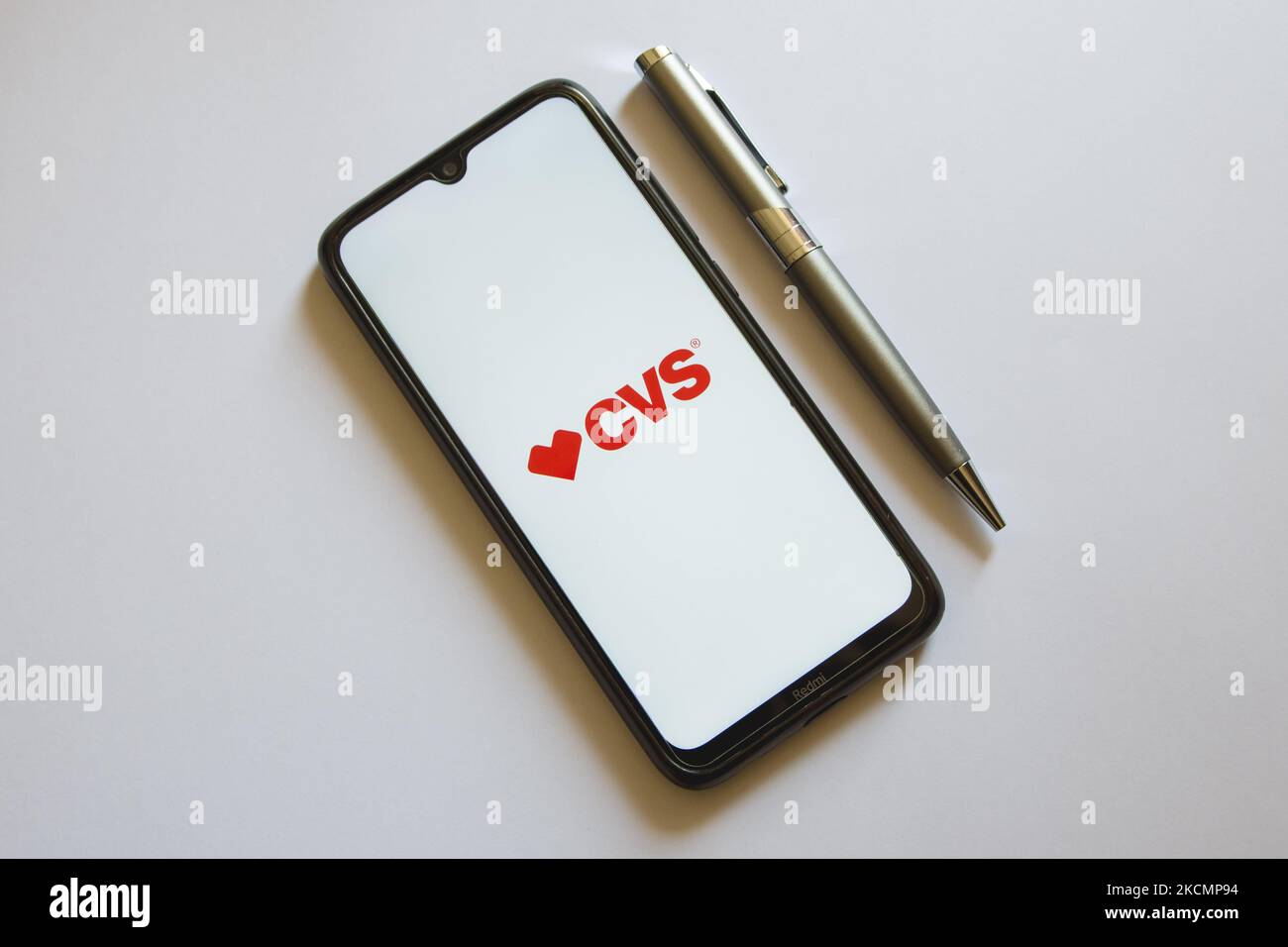 In this photo illustration a CVS Pharmacy logo is display on a ...