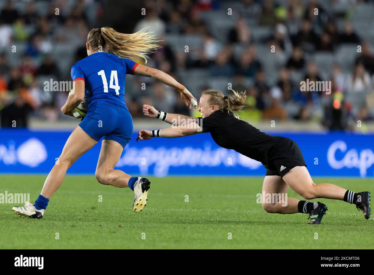 France's Joanna Grisez gets away from New Zealand's Kendra Cocksedge during the Women's Rugby World Cup semi-final match at Eden Park, Auckland. Picture date: Saturday November 5, 2022. Stock Photo