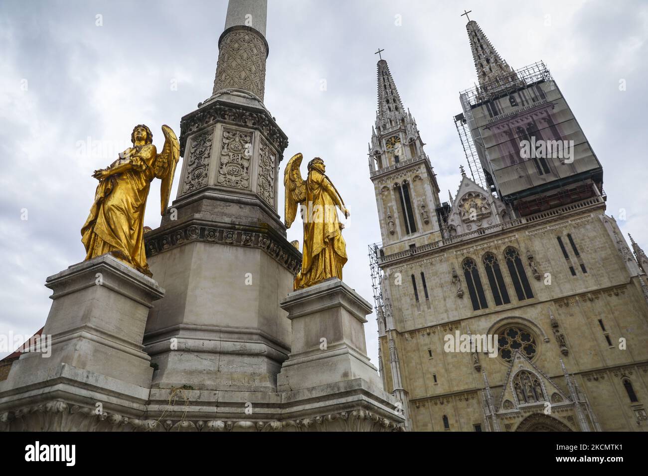 Golden angel statues on the fountain in front of the Cathedral of the Assumption of the Blessed Virgin Mary in Zagreb, Croatia on September 16, 2021. (Photo by Beata Zawrzel/NurPhoto) Stock Photo