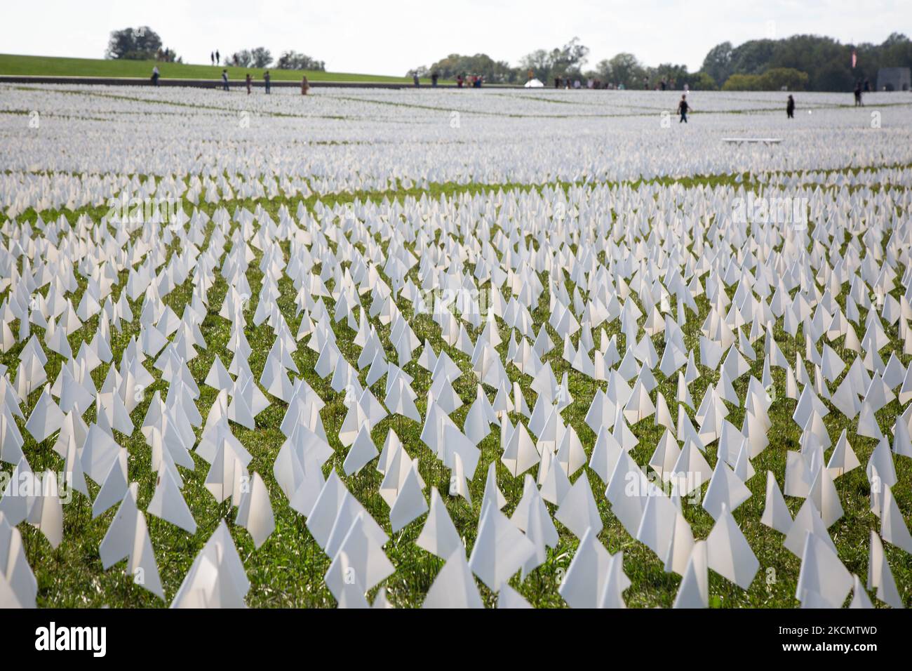 An exhibition of white flags representing more than 600,000 Americans who have died of COVID-19 covers more than 20 acres of the National Mall in Washington, D.C. on September 18, 2021. (Photo by Karla Ann Cote/NurPhoto) Stock Photo