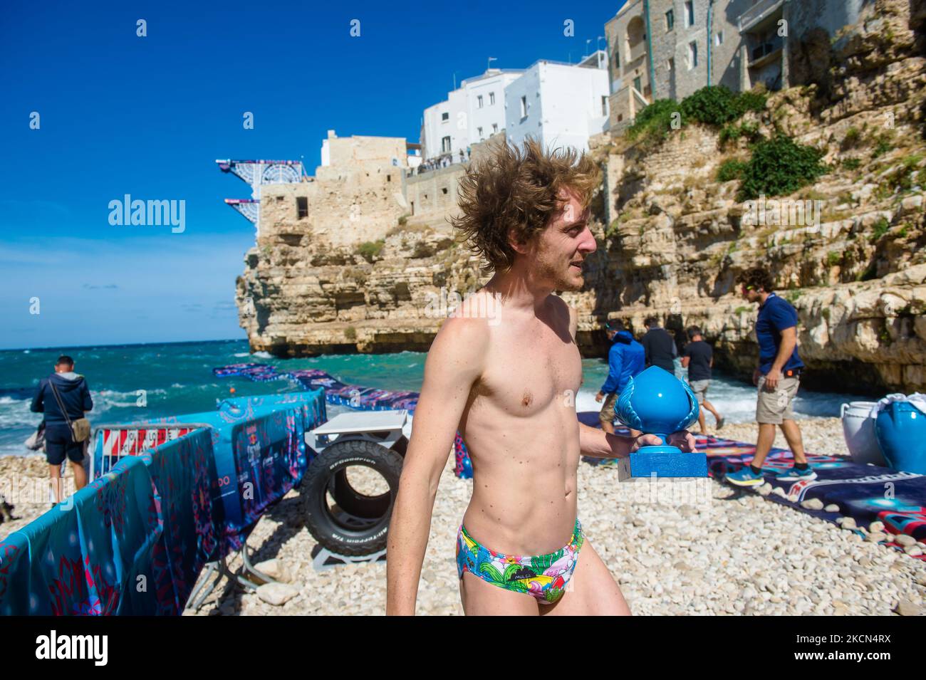 The winner of the stage in Polignano a Mare during the Red Bull Cliff Diving 2021 at Lama Monachile on 22 September 2021. Red Bull Cliff Diving has arrived in Puglia, in Polignano a Mare, in the suggestive glimpse of Lama Monachile. Twelve male and twelve female athletes dived from 27 and 21 meters in a spectacular series of competitive dives. (Photo by Davide Pischettola/NurPhoto) Stock Photo