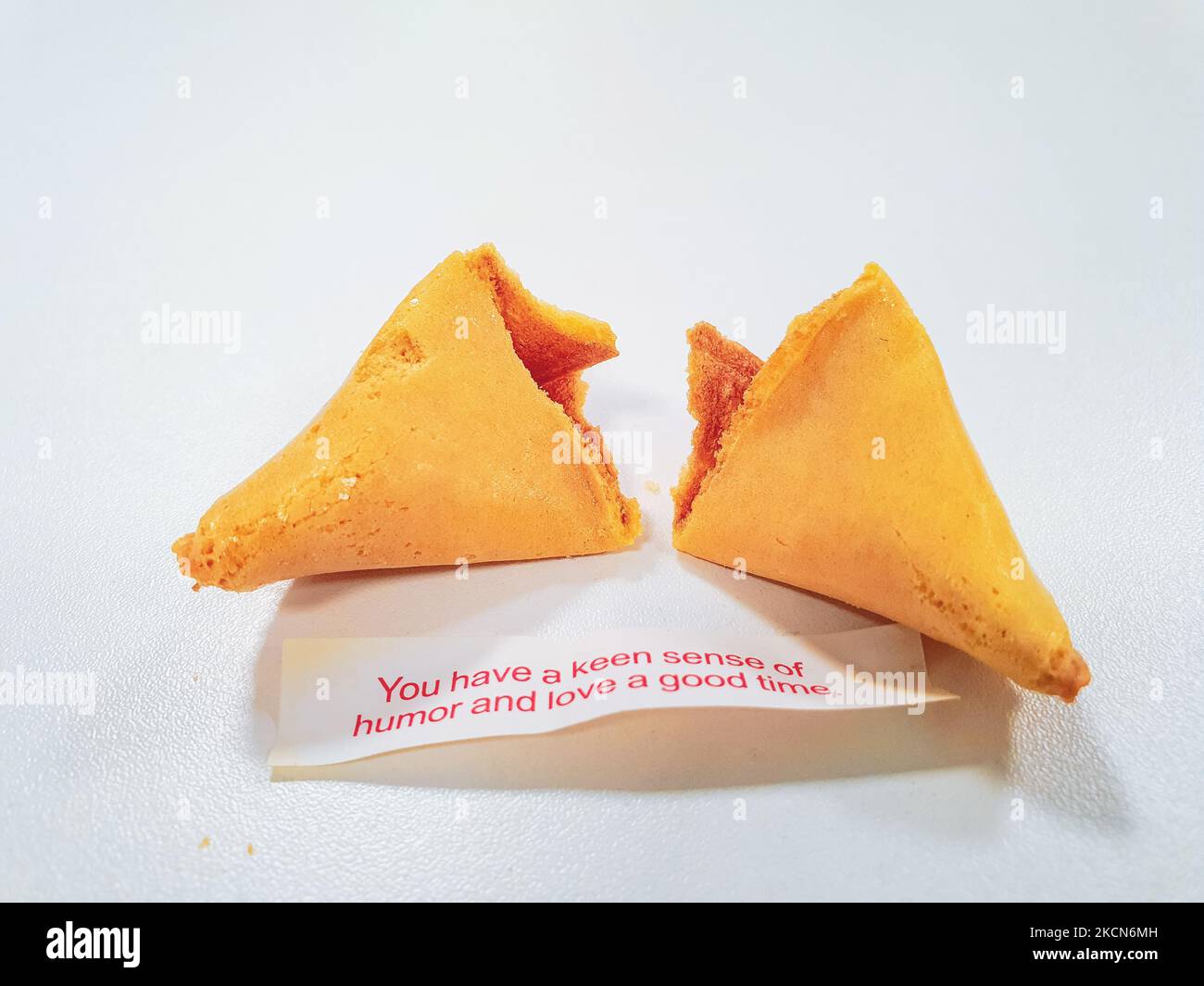 Broken fortune cookie with a positive vibe message under it and copy