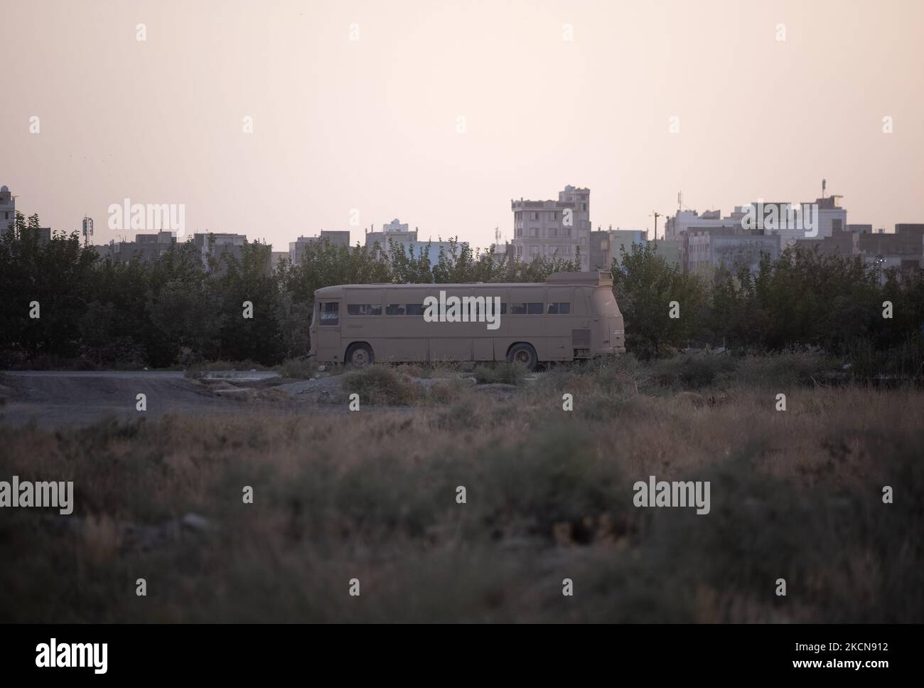 A bus covered by mud as a symbol of the days of war with Iraq in a war exhibition which is held and organized by the Islamic Revolutionary Guard Corps (IRGC) in a park in southern Tehran to mark the anniversary of the Iran-Iraq war (1980-88) on September 23, 2021. (Photo by Morteza Nikoubazl/NurPhoto) Stock Photo