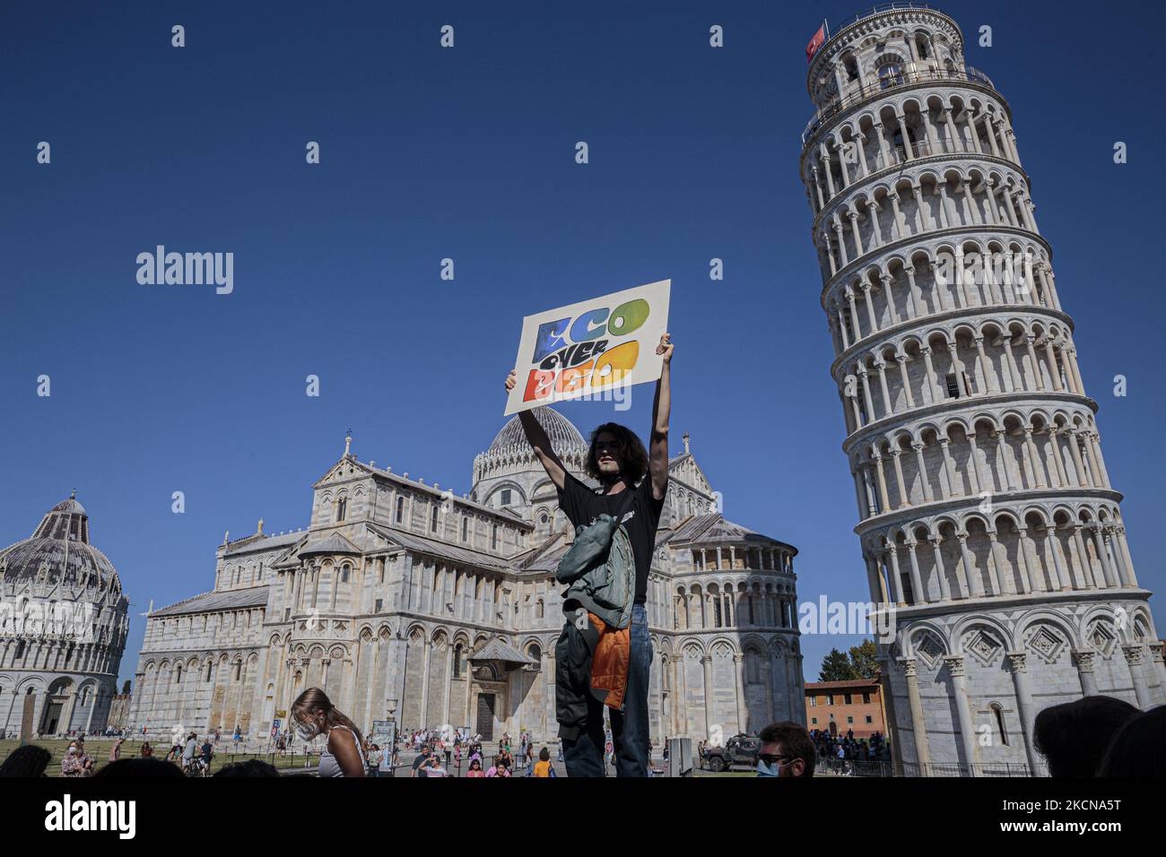 People attending the 24th September global climate strike organized by the Friday For Future movement in front of the leaning tower in Pisa, Italy, on September 24, 2021. Started by 16-year-old Greta Thunberg, International Earth Strikes gathered activists around the world to demand actions from politicians on the climate crisis. (Photo by Enrico Mattia Del Punta/NurPhoto) Stock Photo