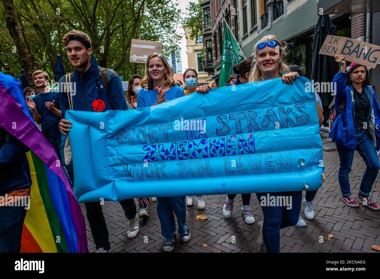 A group of students are holding a bath mattress with a message in support of the Earth, during the Global Climate Strike organized in Utrecht, on September 24th, 2021. (Photo by Romy Arroyo Fernandez/NurPhoto) Stock Photo