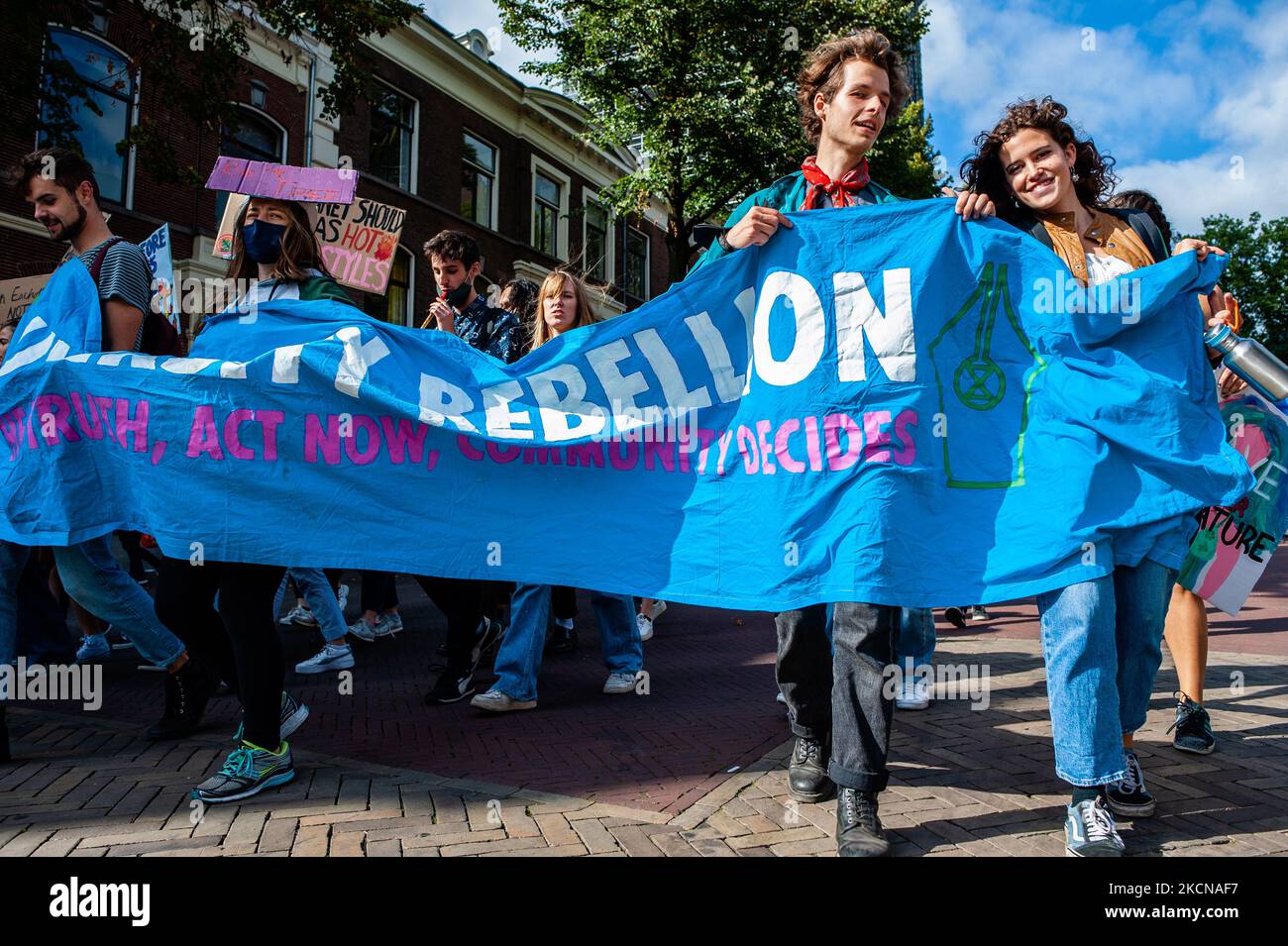 A group from XR University is holding a big banner, during the Global Climate Strike organized in Utrecht, on September 24th, 2021. (Photo by Romy Arroyo Fernandez/NurPhoto) Stock Photo