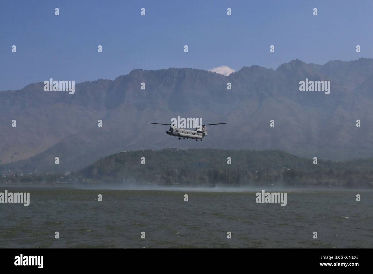 An Indian Air force (IAF) helicopter Chinook flies over Dal lake during an Air show conducted by IAF in Srinagar, Indian Administered Kashmir on 26 September 2021. The event was held after a gap of 13 years in the Kashmir valley, however, the road leading to Mughal gardens was closed down for the public moment for 25 and 26 September. (Photo by Muzamil Mattoo/NurPhoto) Stock Photo