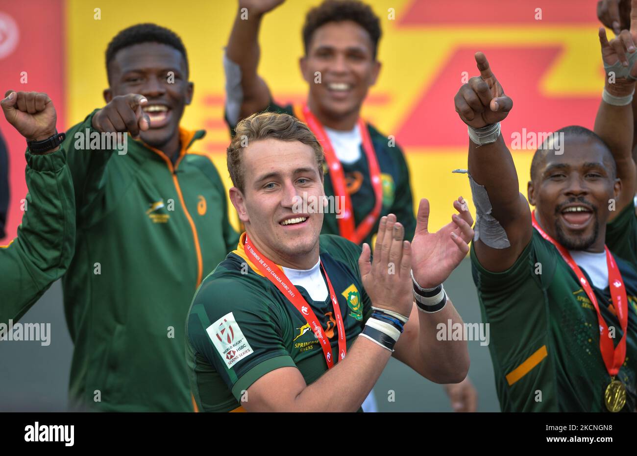 Members of the South African rugby sevens team celebrate at the