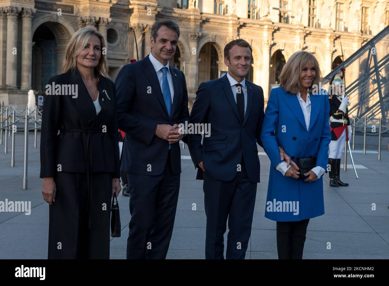 The President of the French Republic, Emmanuel Macron, with First Lady Madame Brigitte Macron, inaugurated the exhibition 'Paris-Athens. Birth of Modern Greece' at the Louvre Museum in the company of Kyriakos Mitsotakis, Prime Minister of the Hellenic Republic, and his wife Mareva Grabowski, in Paris, September 27, 2021. (Photo by Andrea Savorani Neri/NurPhoto) Stock Photo