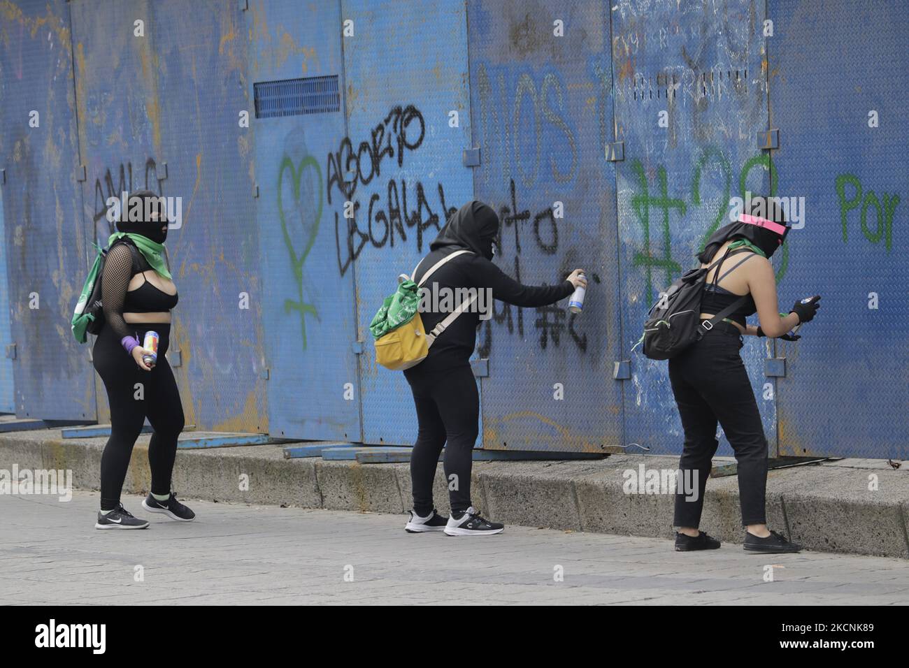 A group of women from the Black Bloc painted on fences under the Angel of Independence in Mexico City, on the occasion of the Global Day of Action in favour of legal, free and safe abortion in Mexico and Latin America. During the march, there were clashes between demonstrators and police along the route. (Photo by Gerardo Vieyra/NurPhoto) Stock Photo