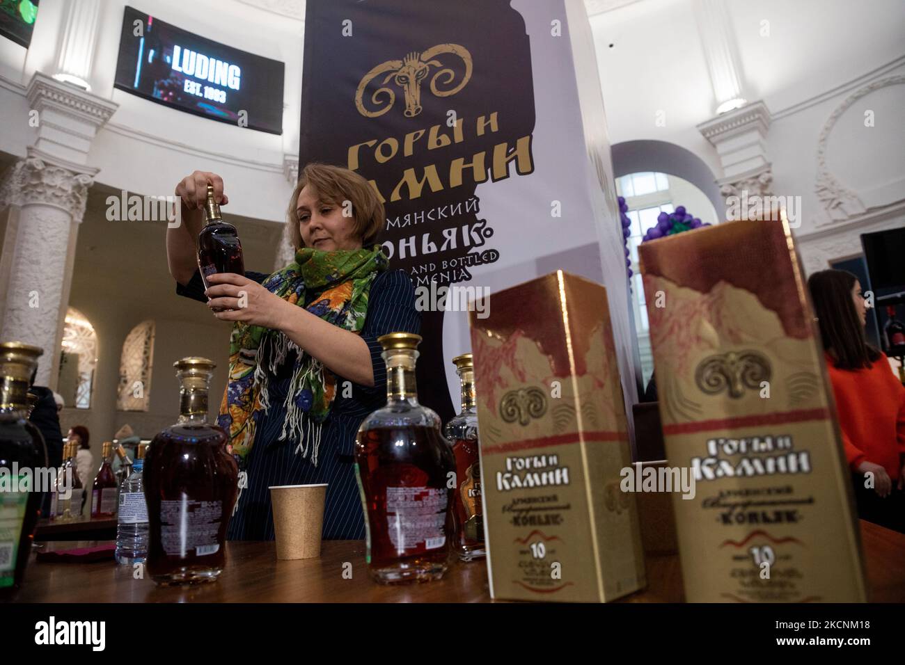 Moscow, Russia. 4th of November, 2022 A woman offers visitors to taste