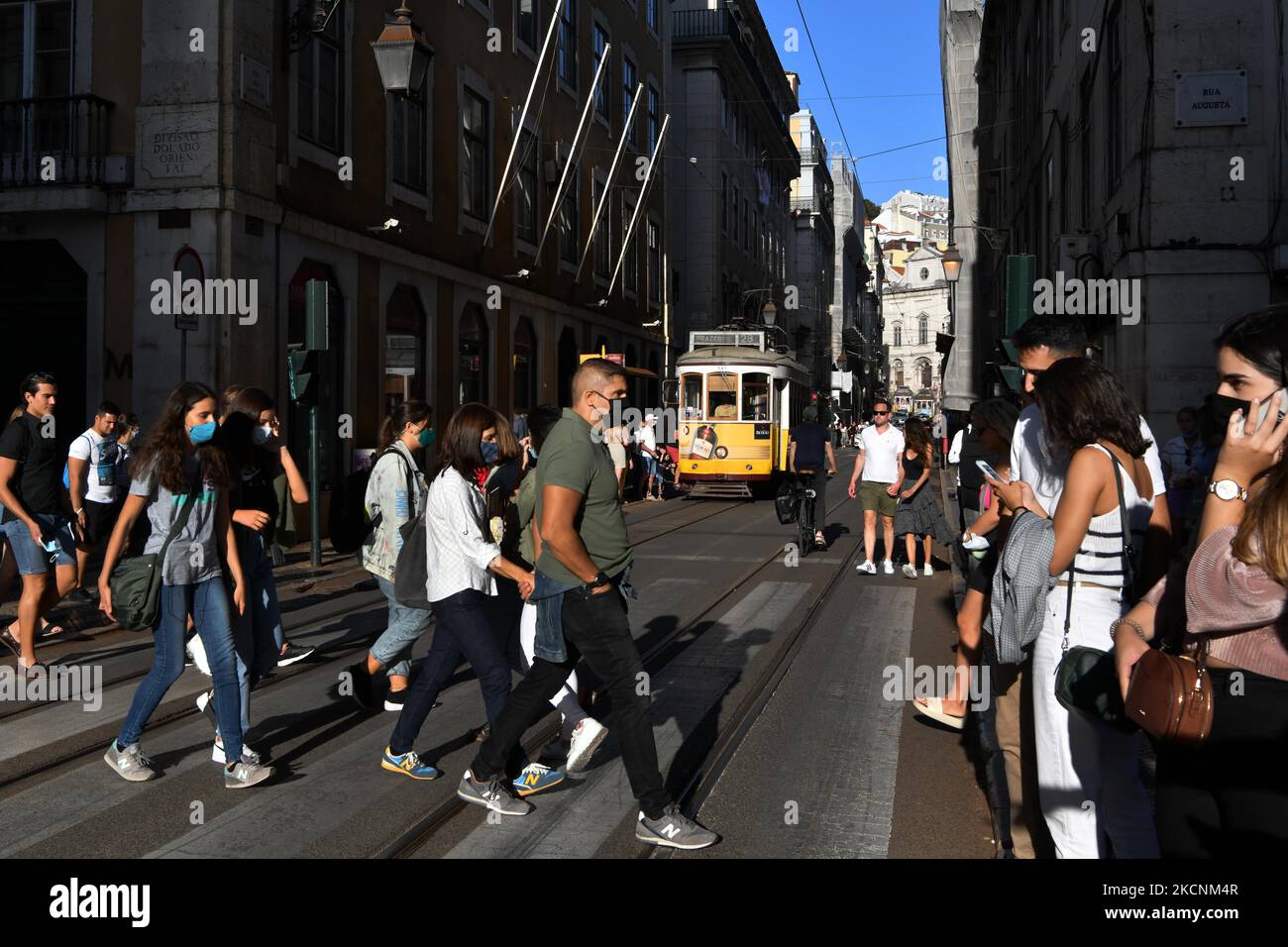 People walk through the Baixa district of Lisbon, Portugal on September 27, 2021. Portugal recorded one death and 230 new cases of SARS-CoV-2 coronavirus infection, according to the latest data from the General Directorate of Health, released Monday. It has been more than four months since the number of new cases per day was so low, since May 17, 2021. (Photo by Jorge Mantilla/NurPhoto) Stock Photo