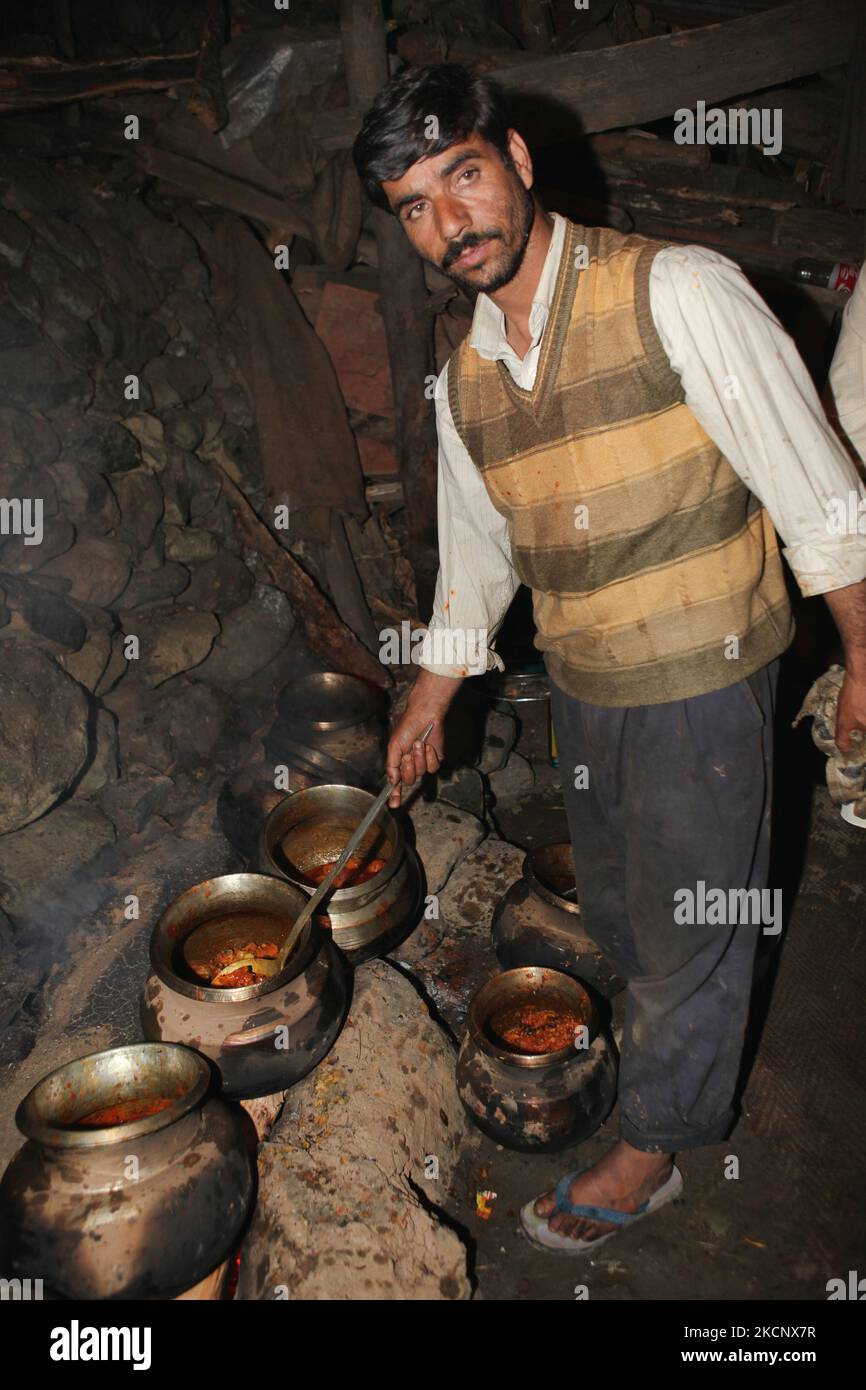 A Kashmiri waza (expert cook) prepares a wazwan (banquet) of 54 meat ...