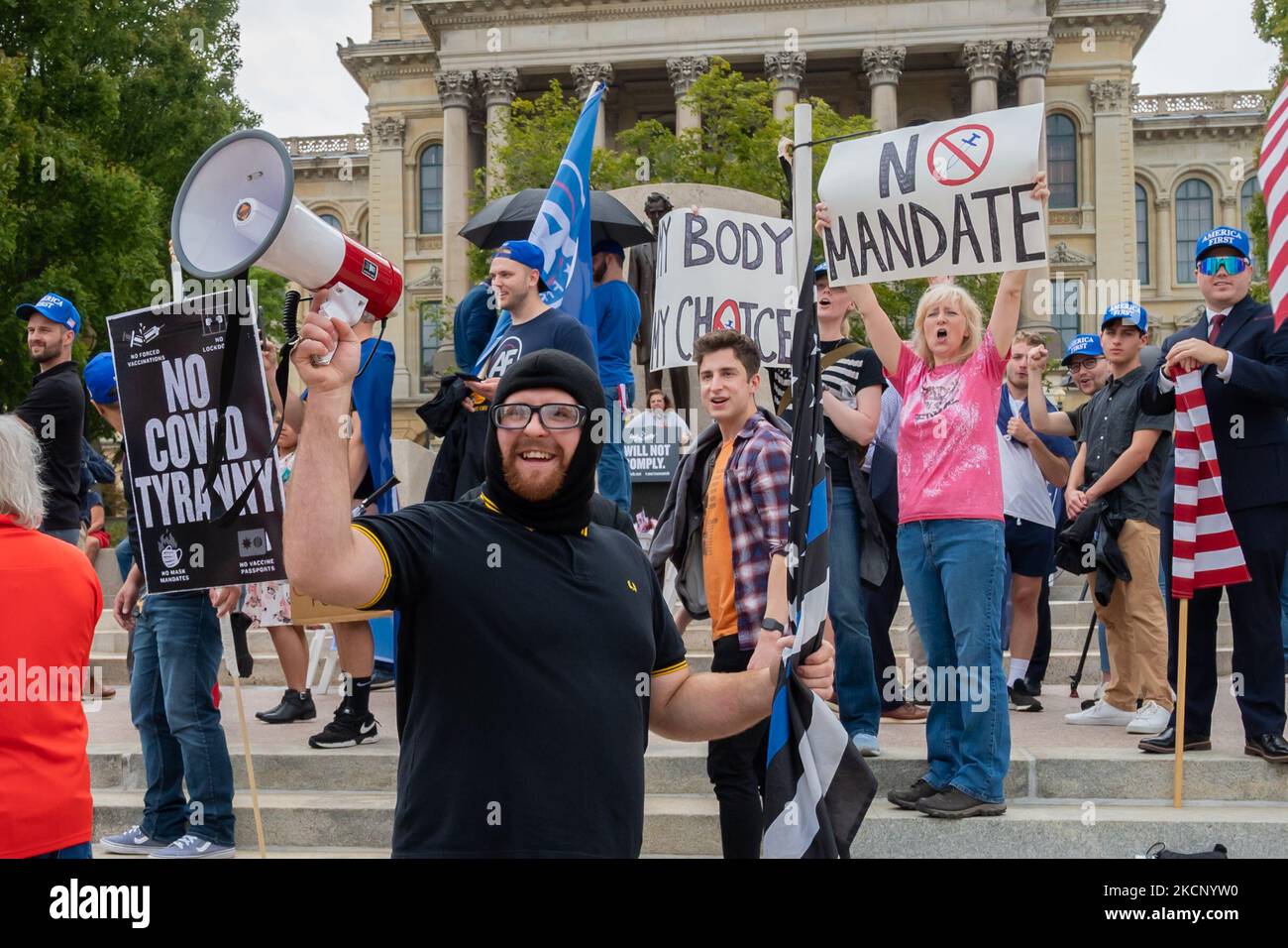 An anti-COVID tyranny protest is seen outside the Illinois State Capitol on October 2, 2021 in Springfield, Illinois, United States. The event was organized by America First host Nicholas Fuentes, as Anthime Gionet (also known as Baked Alaska) was in attendance. The protest entailed anti-vaccine mandate, no mask mandate, no forced vaccination and no vaccine passport initiatives. (Photo by Patrick Gorski/NurPhoto) Stock Photo