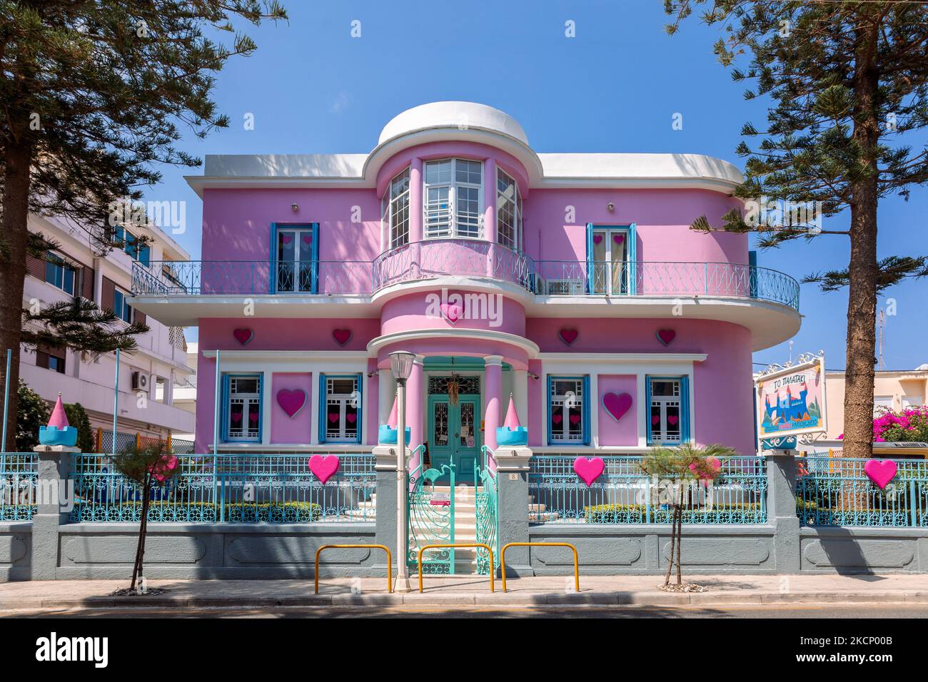 Rhodes, Greece - August 23, 2022: Beautiful colorful elementary school building in Rhodes, Greece. High quality photo Stock Photo