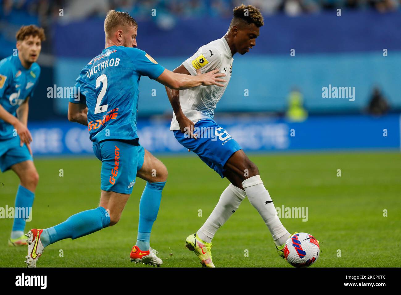 Dmitri Chistyakov (N2) of Zenit and Mateo Cassierra (R) of Sochi vie for the ball during the Russian Premier League match between FC Zenit Saint Petersburg and FC Sochi on October 3, 2021 at Gazprom Arena in Saint Petersburg, Russia. (Photo by Mike Kireev/NurPhoto) Stock Photo