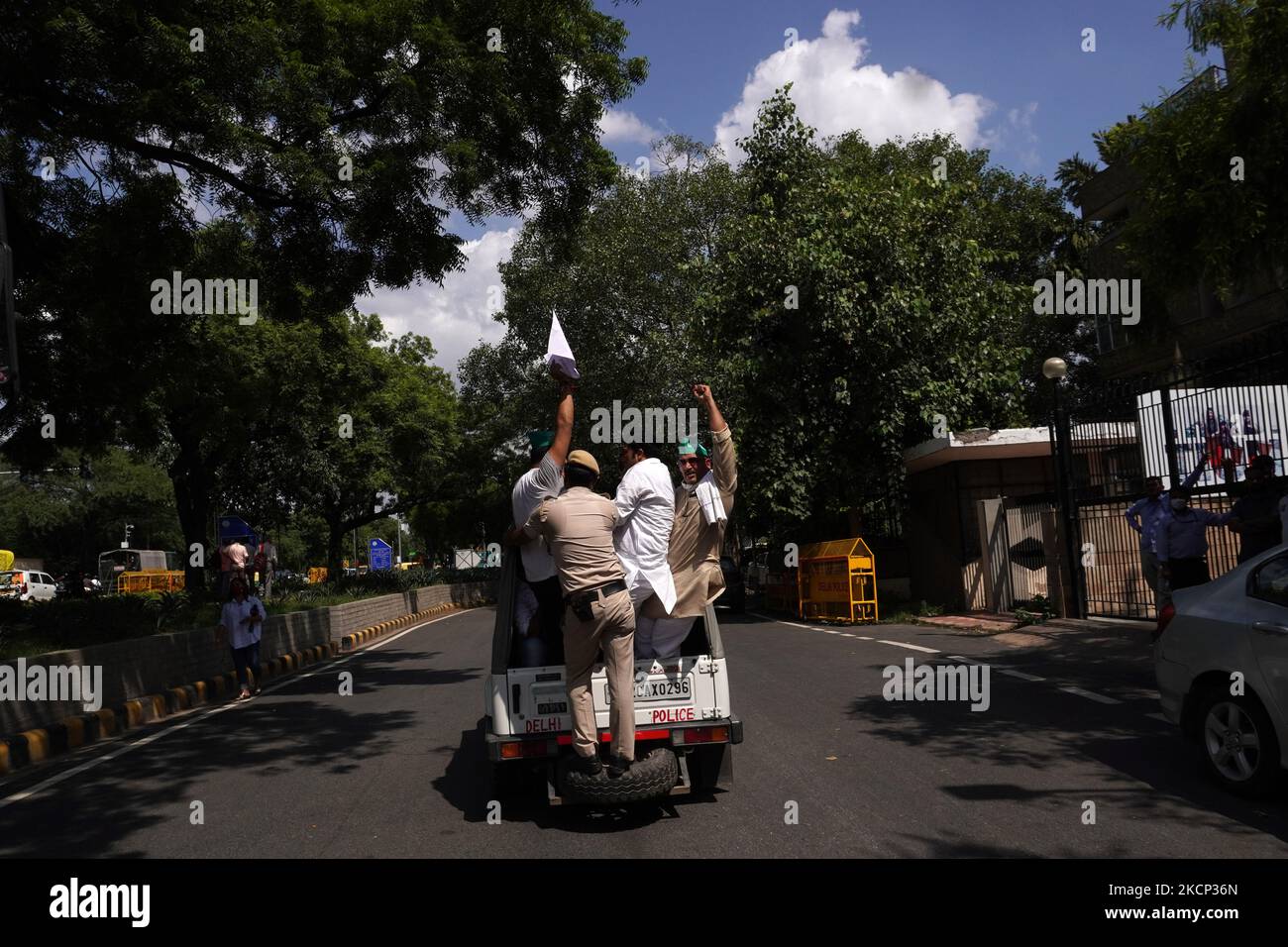 Police personnel detain members of opposition party during a protest against killing of four farmers in Uttar Pradesh's Lakhimpur Kheri after being run over by a car owned by India's Union Minister of State for Home, at UP Bhawan in New Delhi, India on October 4, 2021. (Photo by Mayank Makhija/NurPhoto) Stock Photo