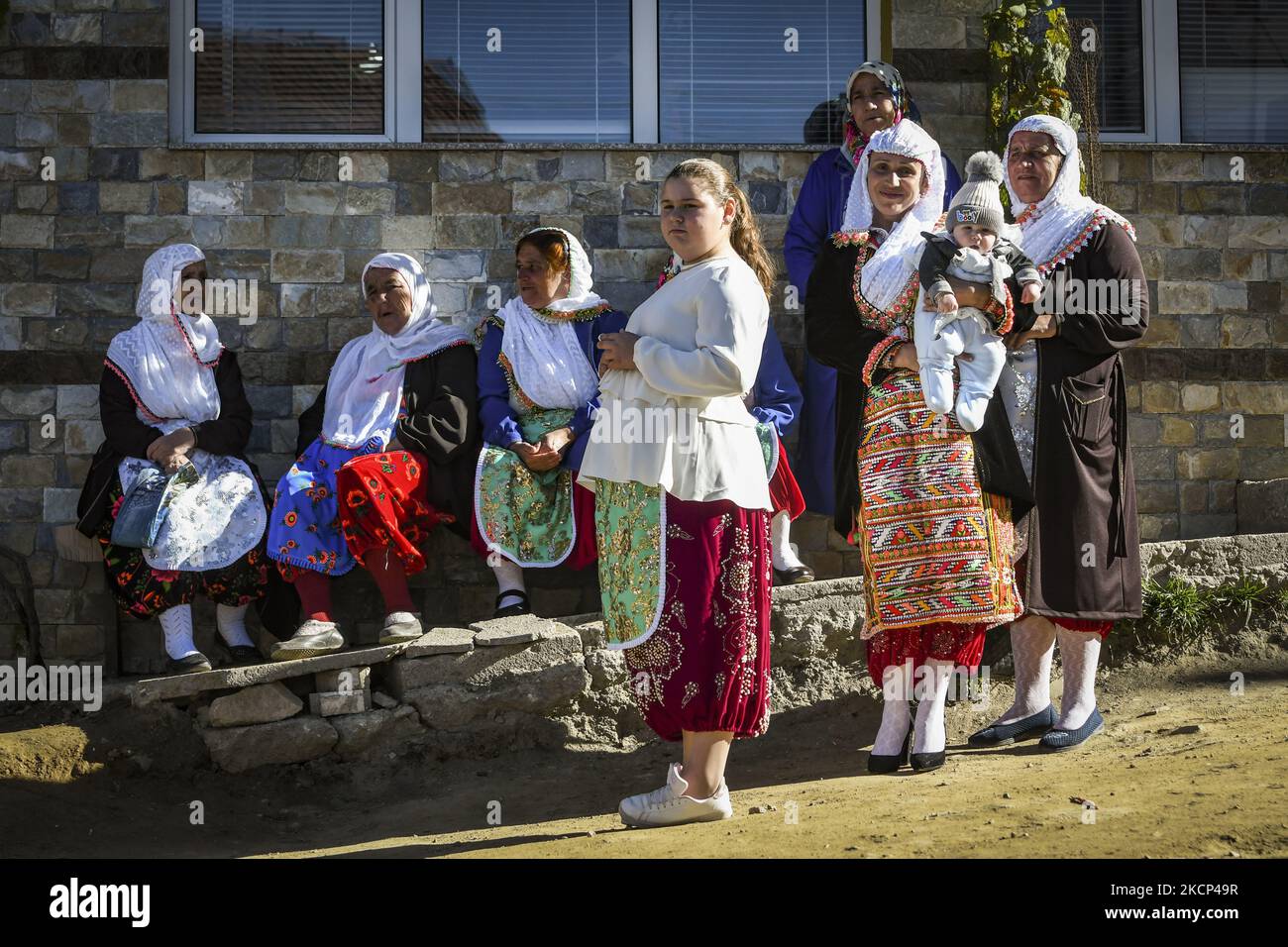 Women wear traditional pomak clothing during traditional circumcision