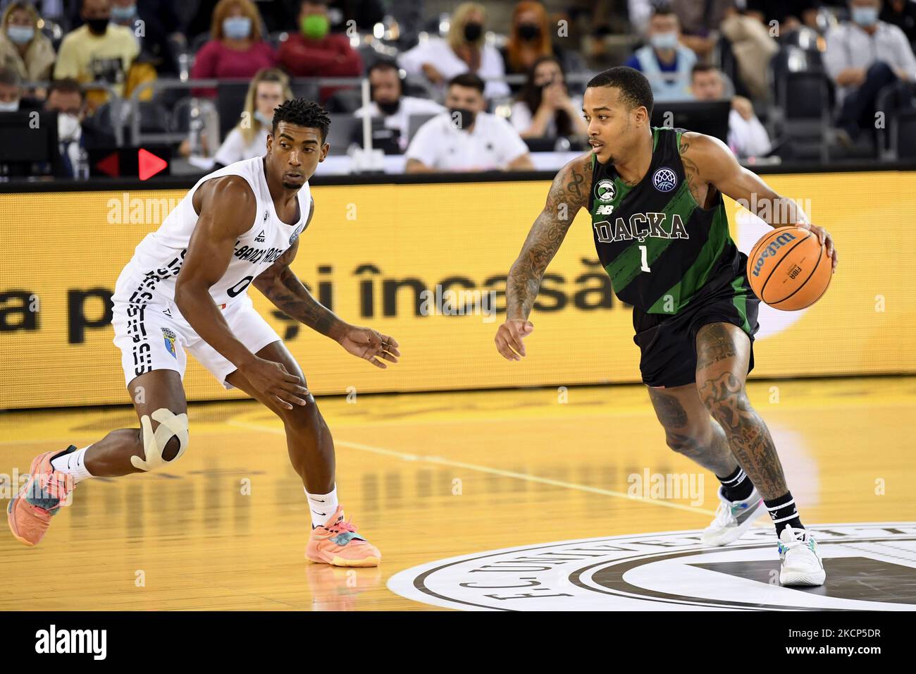 Karel Guzman (L) and Troy Caupain (R) in action during U-BT Cluj-Napoca v Darüssafaka Tekfen in group G of Basketball Champions League, disputed in BT Arena, Cluj-Napoca, 5 October 2021 (Photo by Flaviu Buboi/NurPhoto) Stock Photo